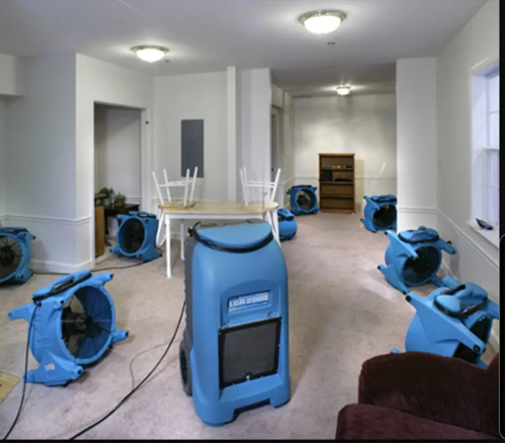 Air movers and dehumidifier setup for Water Damage Restoration in Yelm